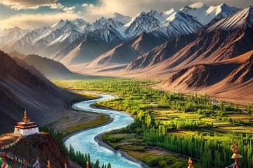 A vibrant river valley with prayer flags and majestic snow-capped mountains.